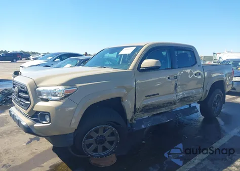 2018 Toyota Tacoma Sr5 V6 z USA, uszkodzony, nr VIN 3TMAZ5CN5JM078027